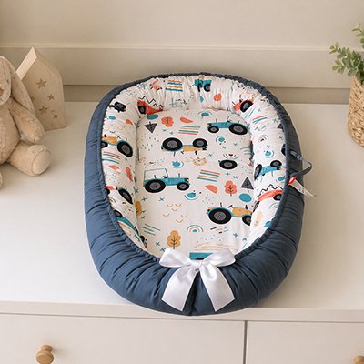 Reducteur de lit bebe  sira